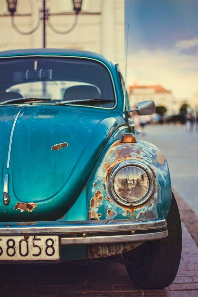blue Volkswagen Beetle close-up photo